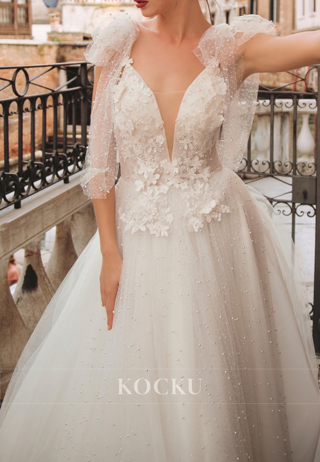 Venice - Inspired Plunging Neck Bow-Strap 3D Floral Tulle Wedding Dress with Pearl Embellishments