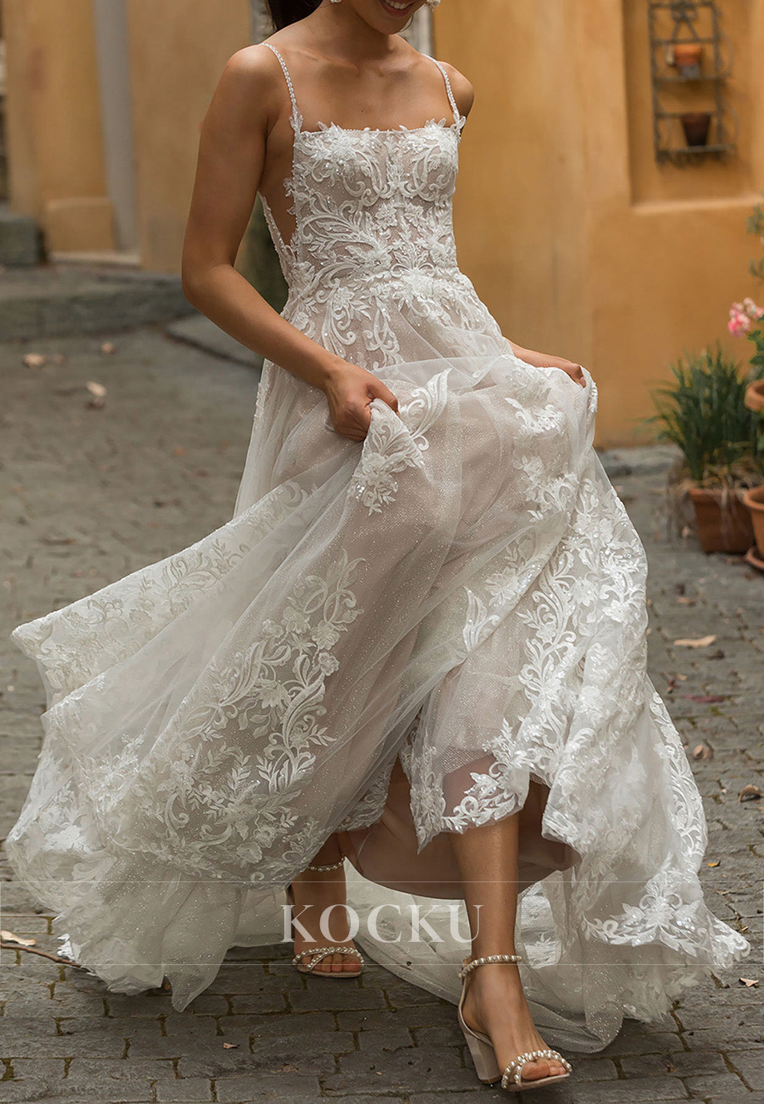 Romantic Spaghetti Strap Sheer Tulle Wedding Dress with Lace Embroidery & Train