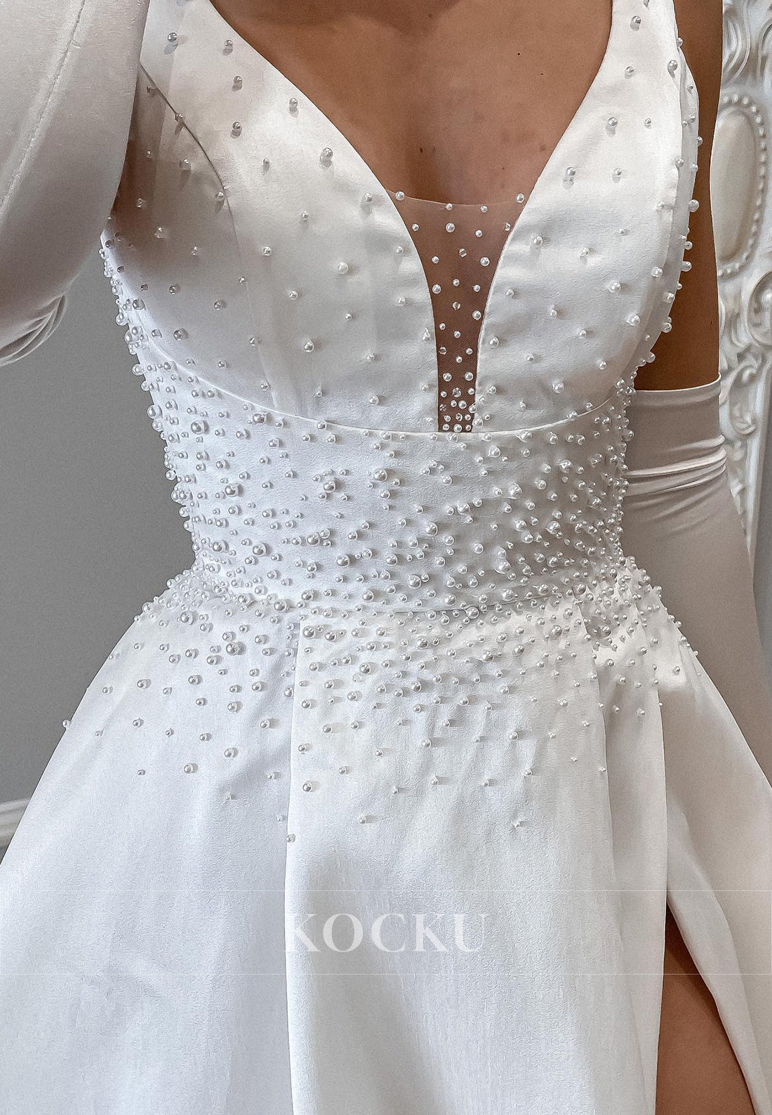 Plunging V - Neck Satin Ball Gown Wedding Dress with Pearl Embellishments & High Slit