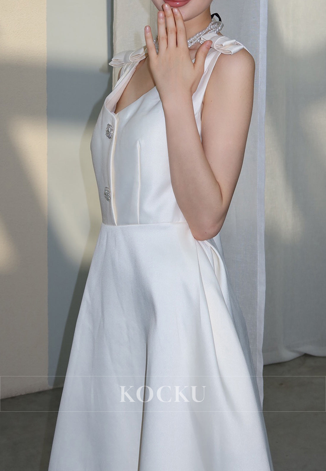 White Satin Midi Dress with Bow Shoulder Details and Crystal Buttons