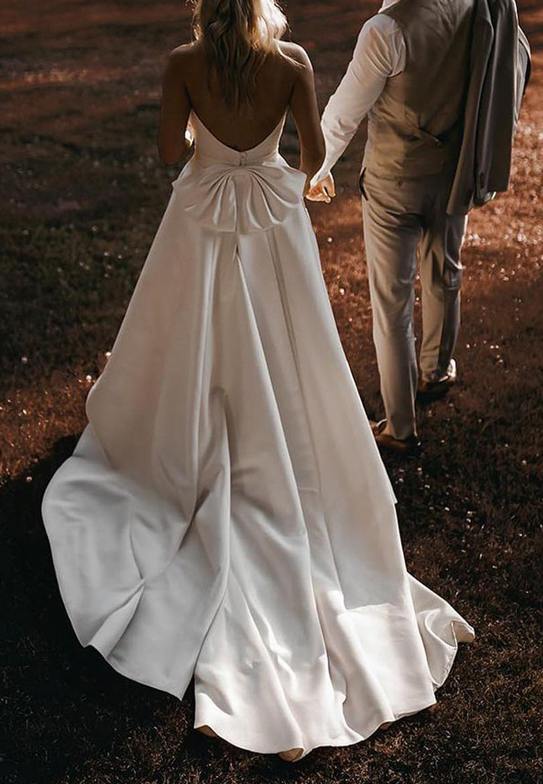 Minimalist Halter Ball Gown Wedding Dress with Open Back Bow Detail & Pockets