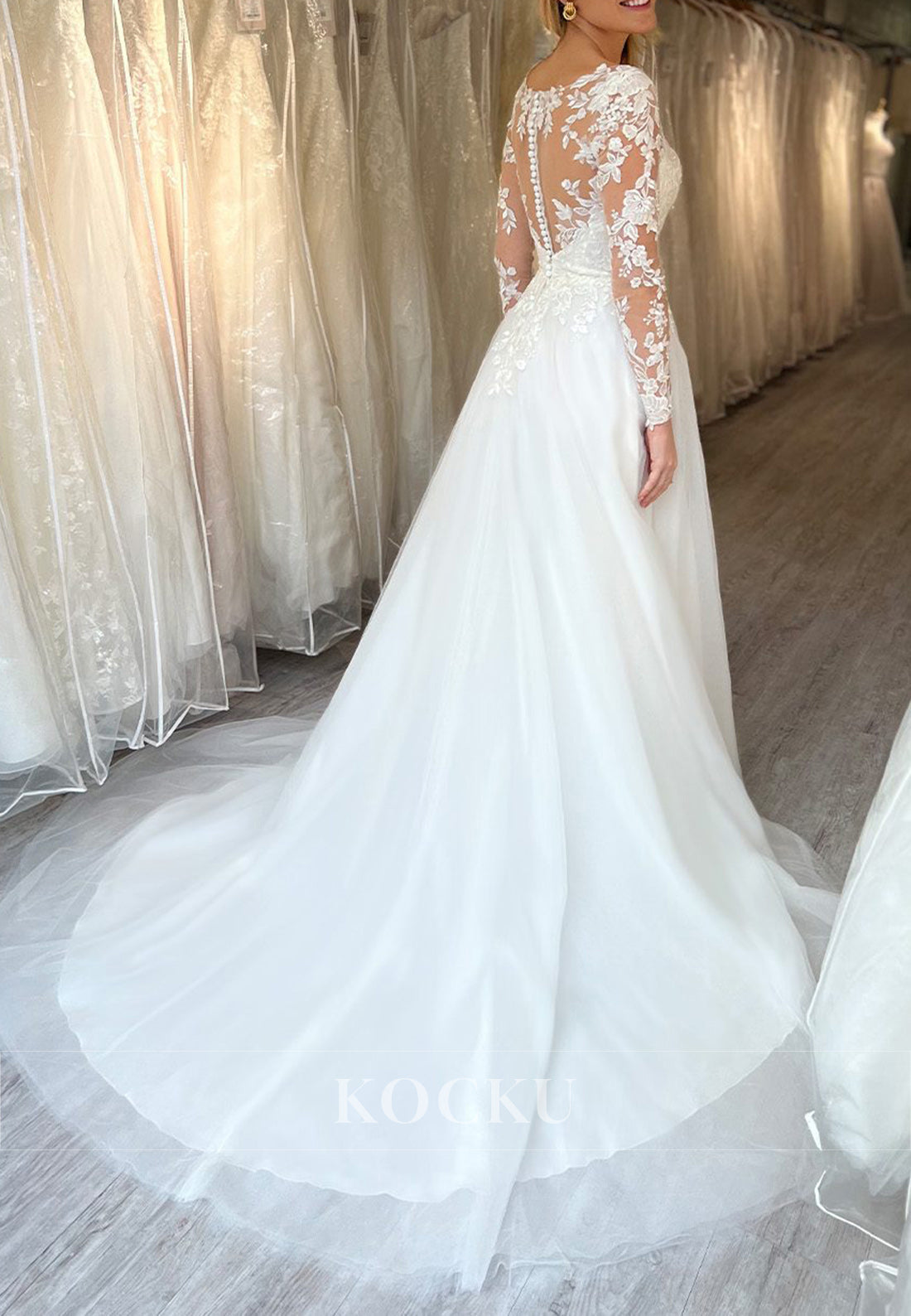 White Appliques Sweetheart Sheer Back A-Line Wedding Dress with Long Sleeves