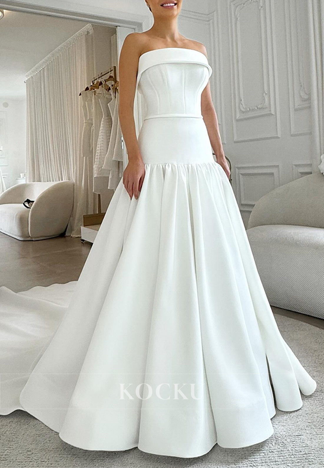 Strapless Satin Ball Gown Wedding Dress with Corset Bodice and Bow Back