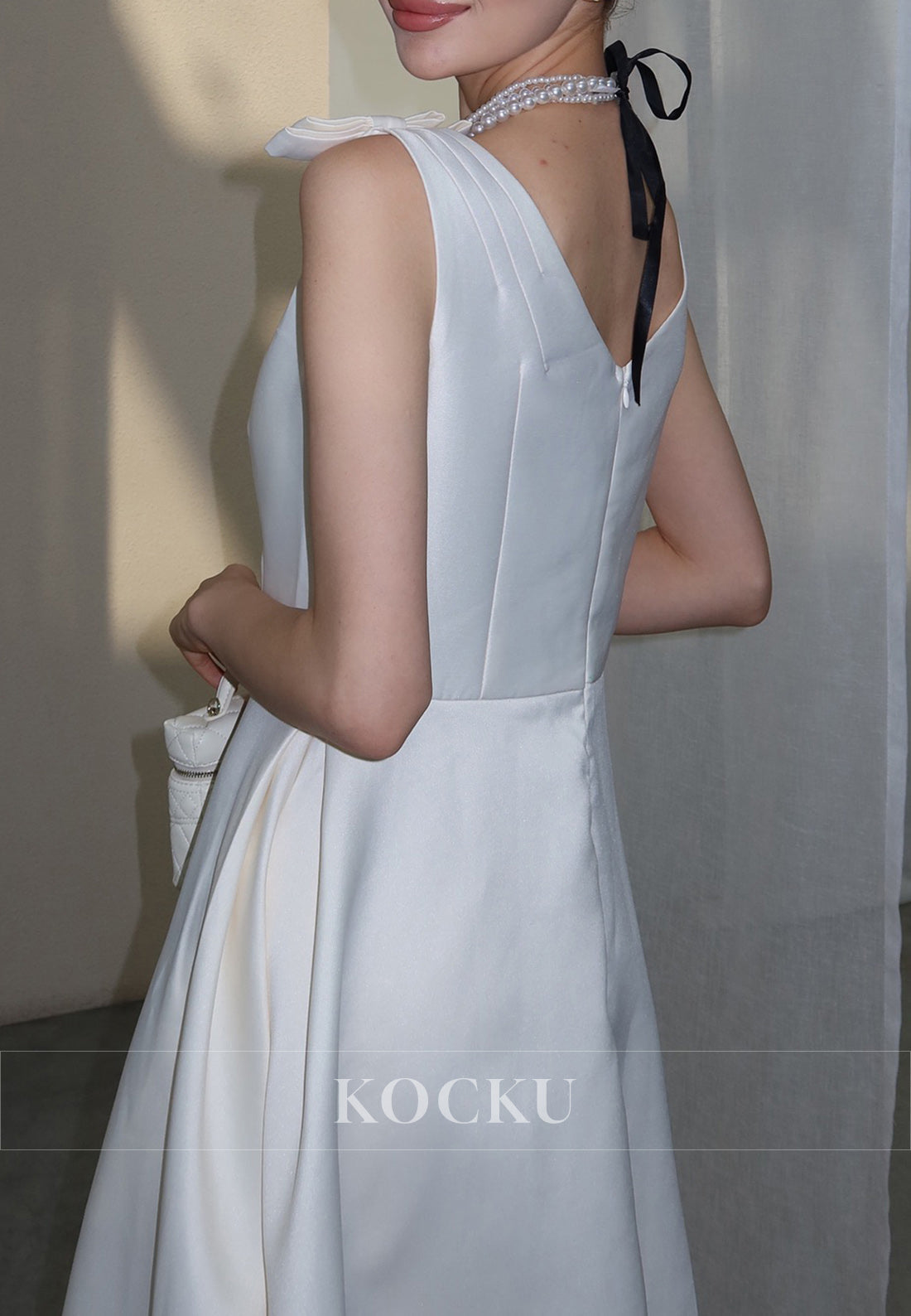 White Satin Midi Dress with Bow Shoulder Details and Crystal Buttons