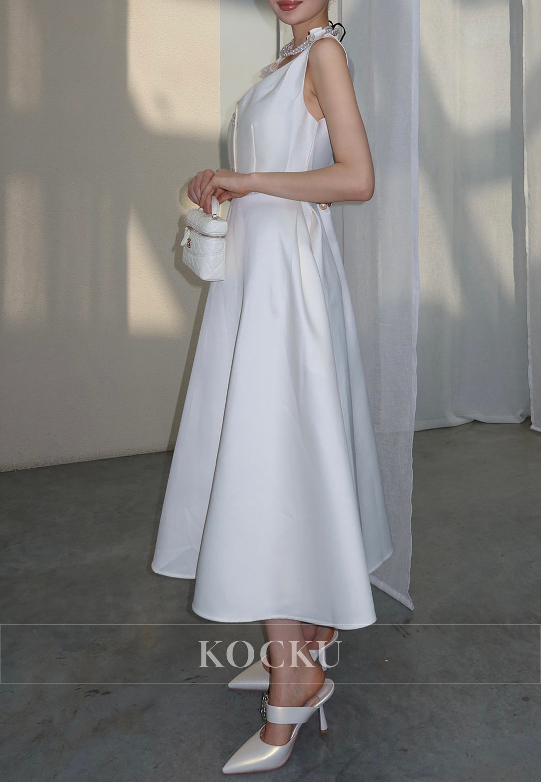 White Satin Midi Dress with Bow Shoulder Details and Crystal Buttons