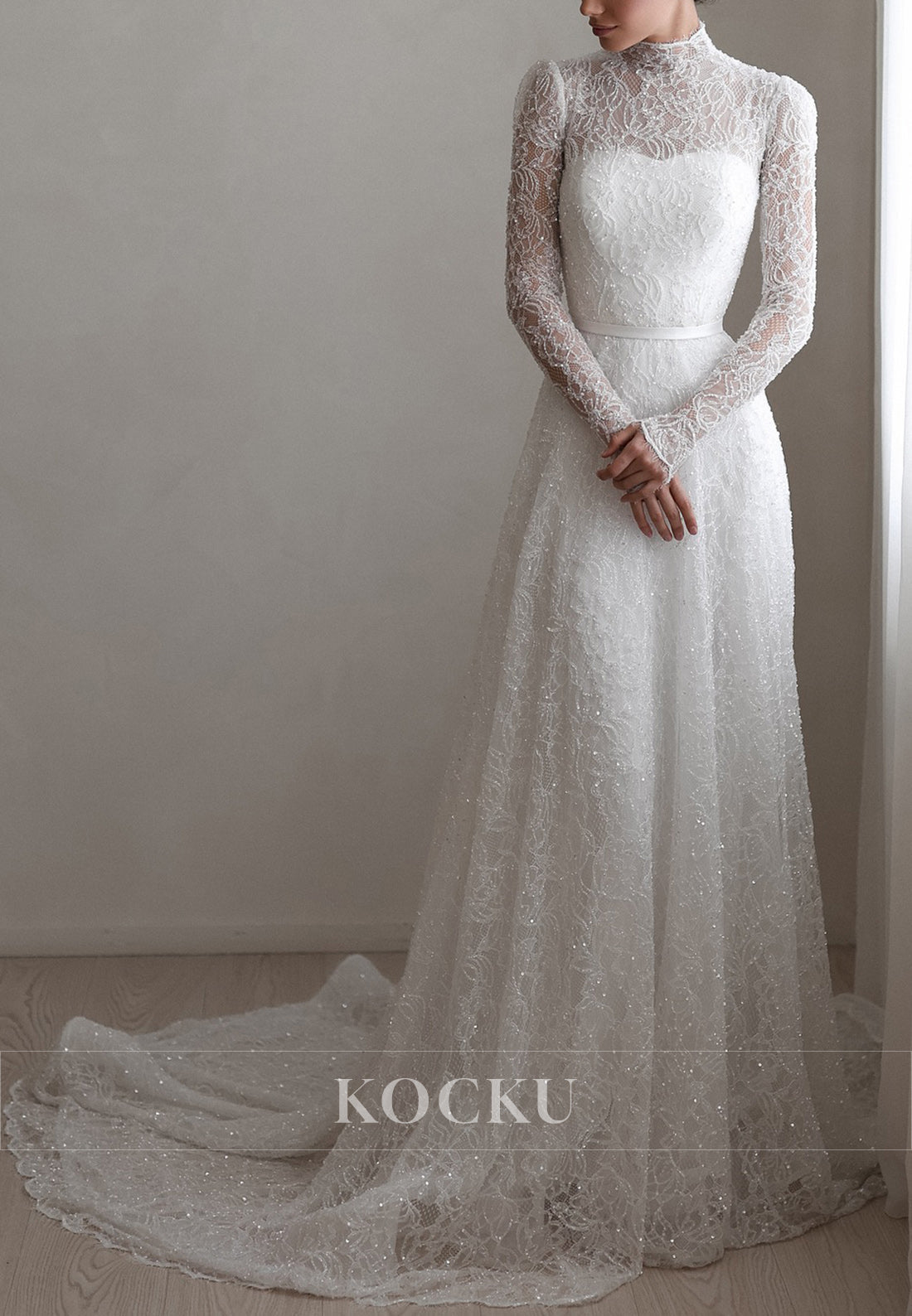 High - Neck Lace Wedding Dress with Sheer Long Sleeves and Sparkle Detailing