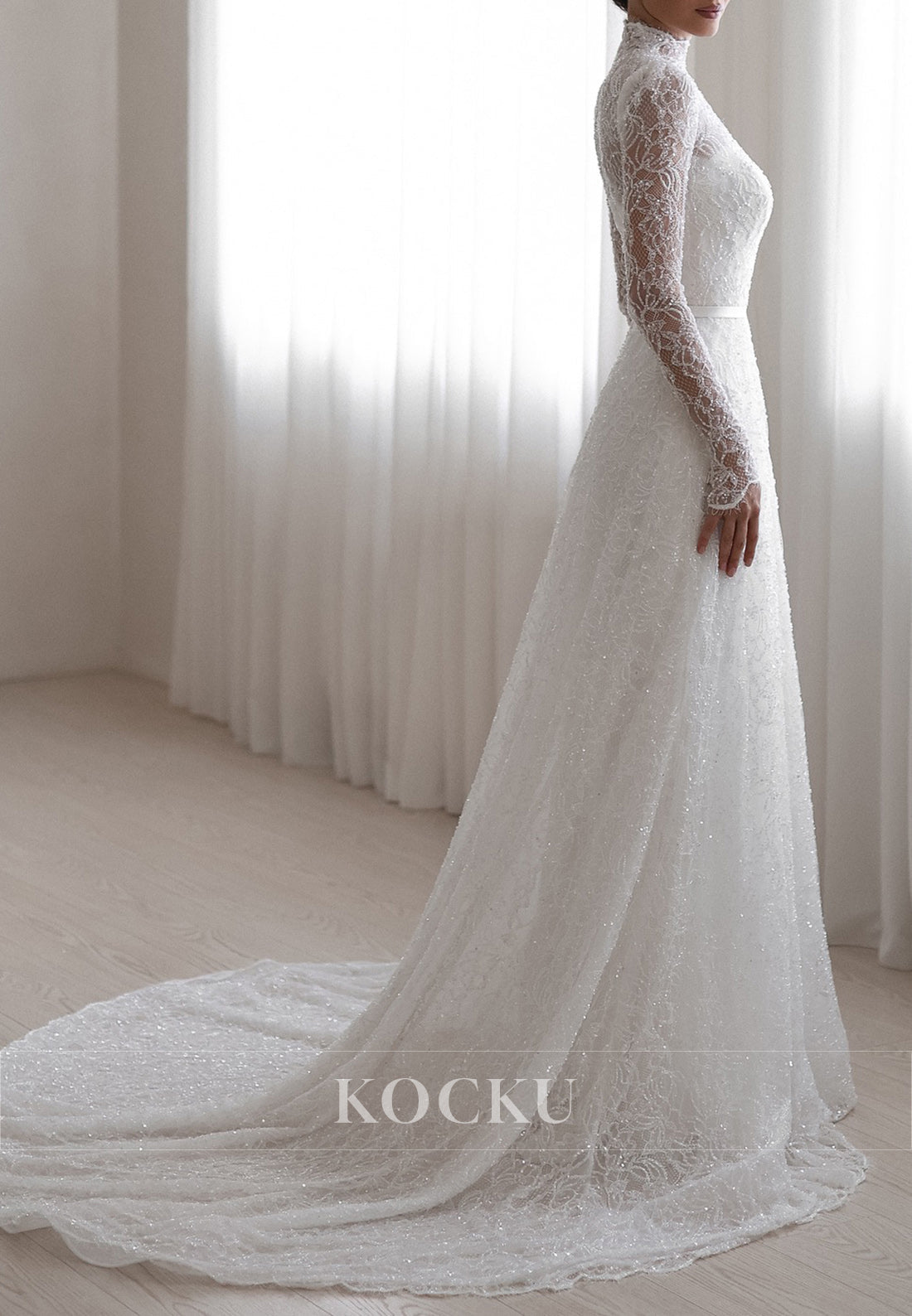 High - Neck Lace Wedding Dress with Sheer Long Sleeves and Sparkle Detailing