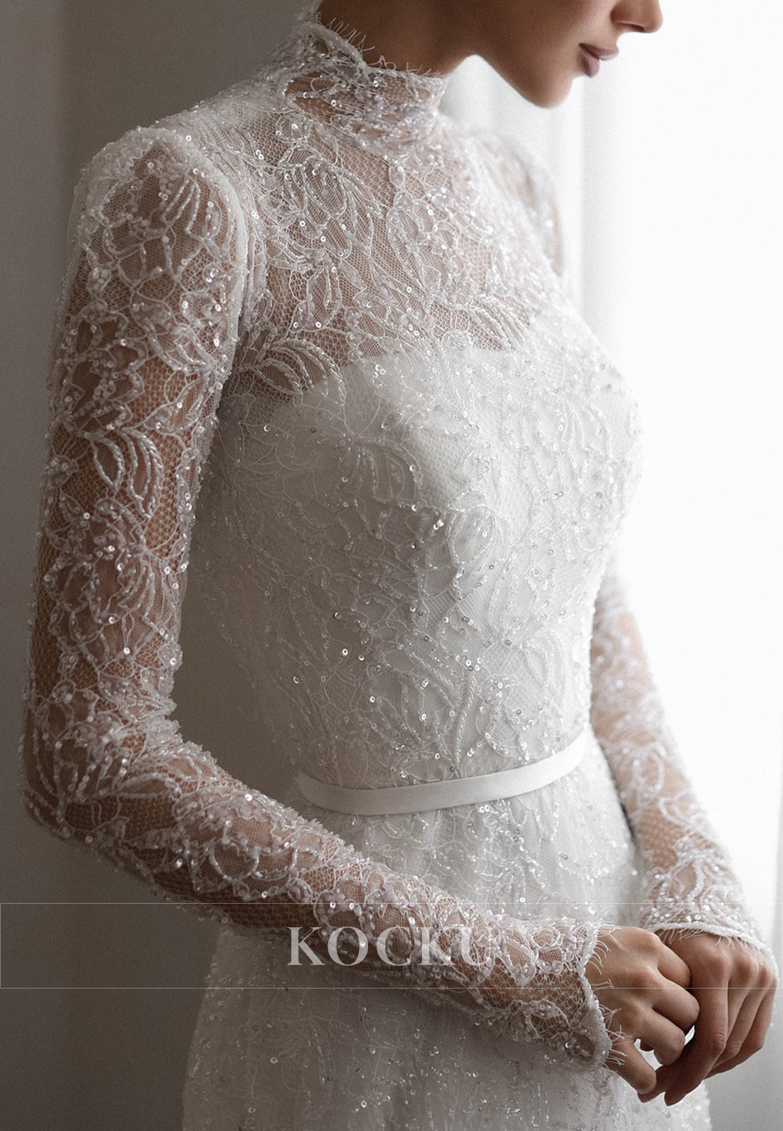 High - Neck Lace Wedding Dress with Sheer Long Sleeves and Sparkle Detailing