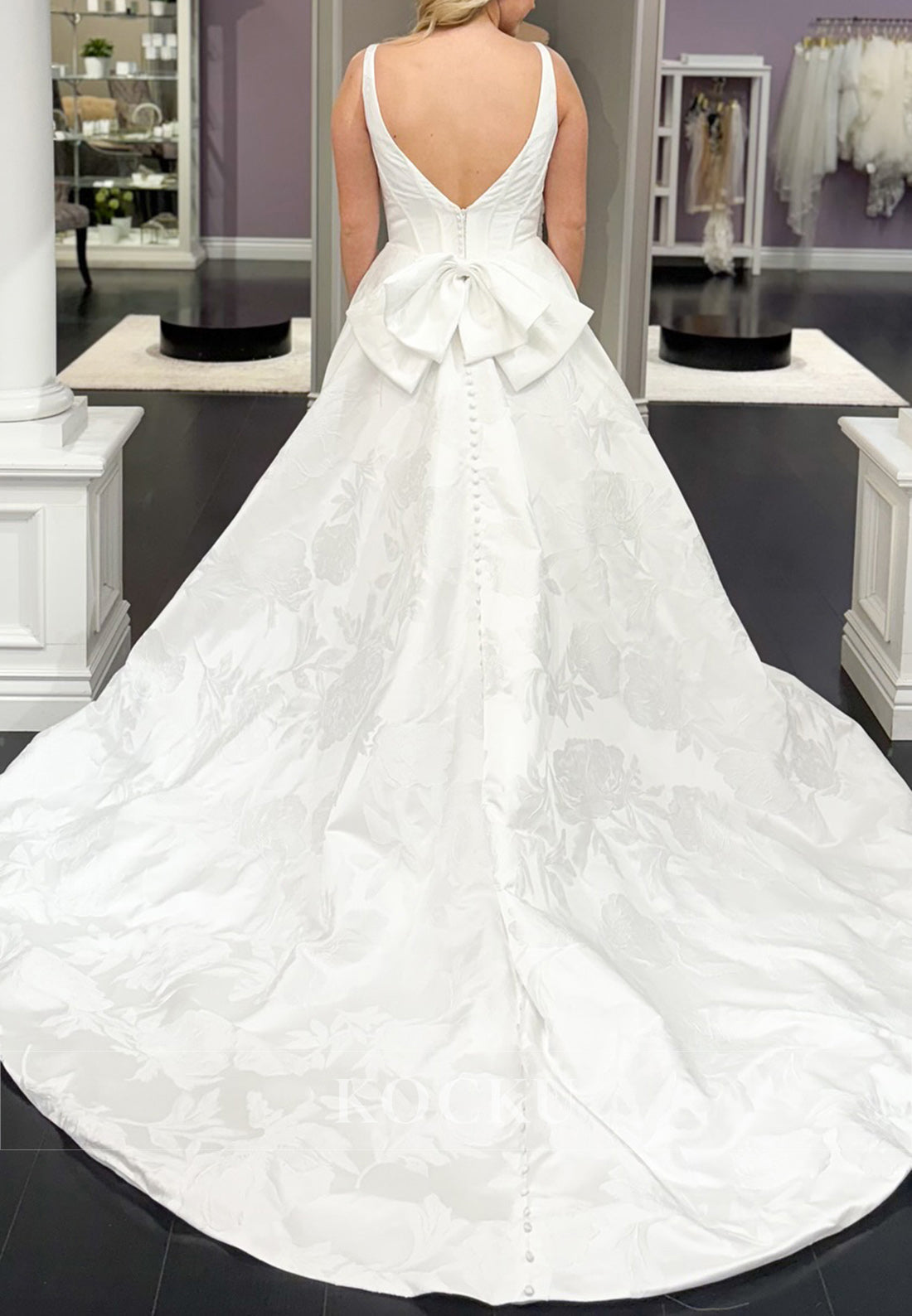 Deep V - Neck Jacquard Ball Gown Wedding Dress with Bow Back Detail