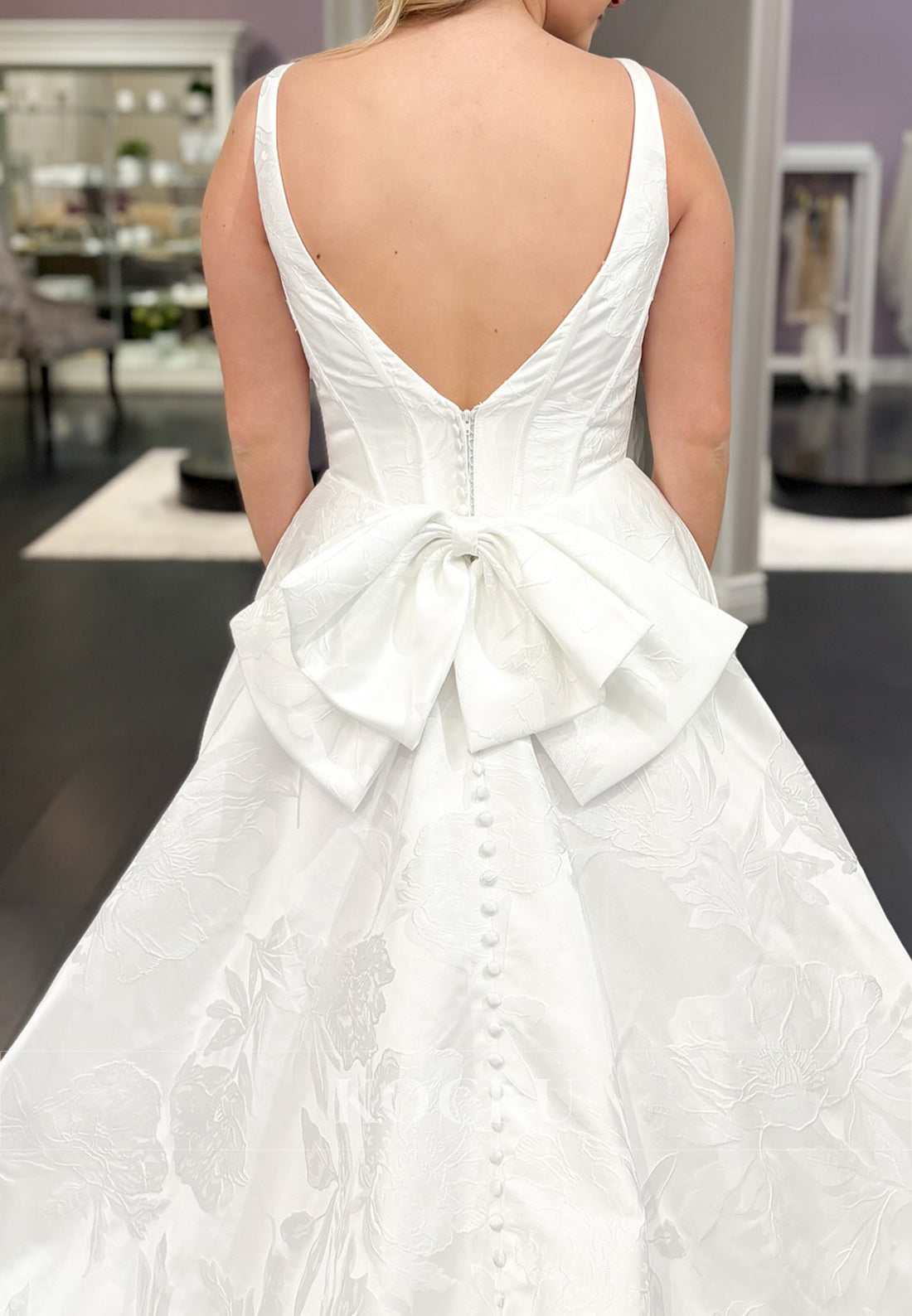 Deep V - Neck Jacquard Ball Gown Wedding Dress with Bow Back Detail