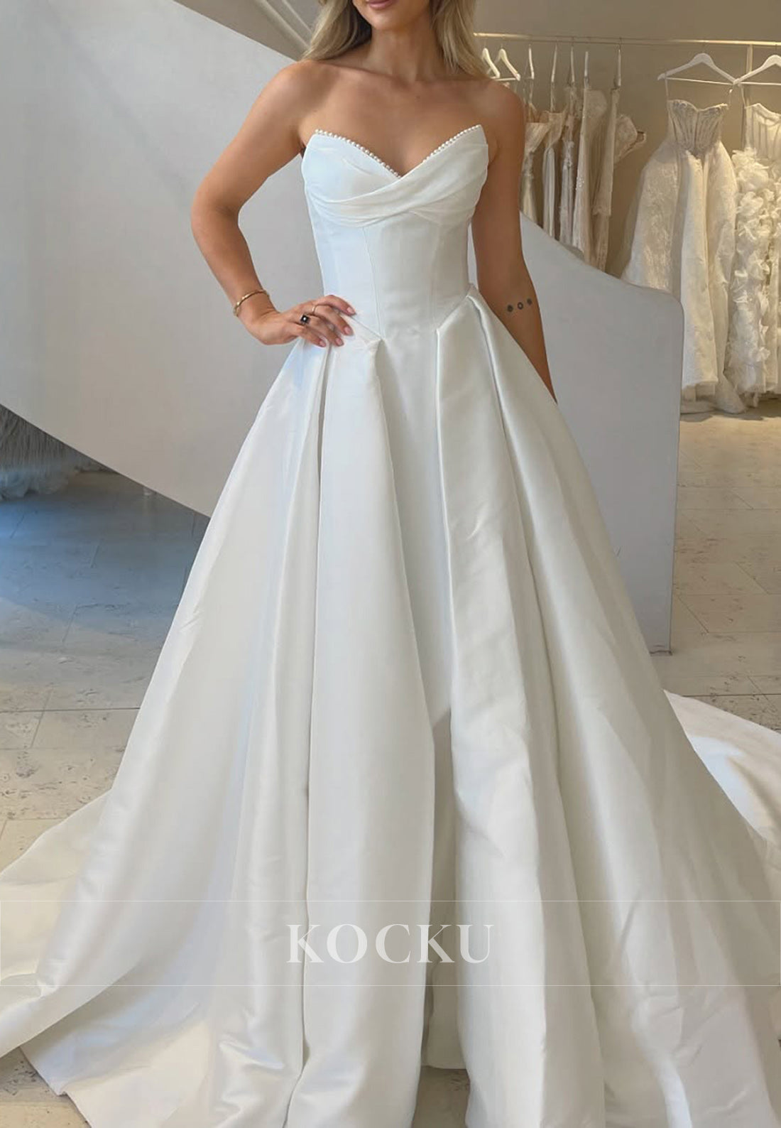 White Strapless Pearls Buttons-Up Back Ballgown Wedding Dress with Slit