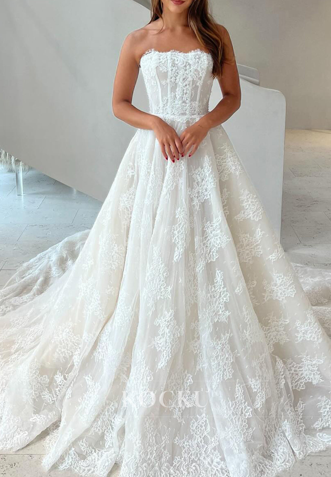 Off-White Lace Strapless Buttons-Up A-Line Wedding Gown
