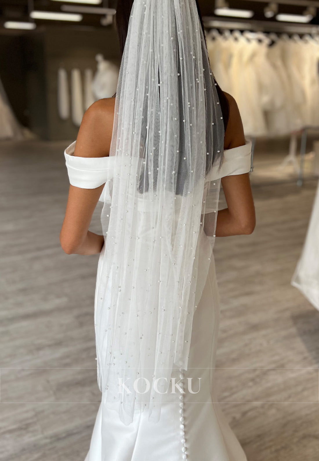Off-the-Shoulder Ruched Buttons Up Back Mermaid Satin Wedding Gown