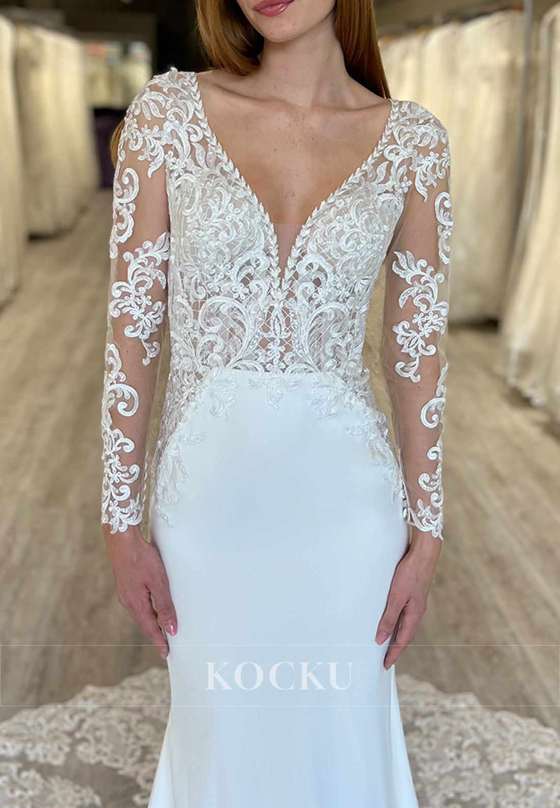 White Lace Bodice Deep Neck Sheer Back Mermaid Wedding Dress with Long Sleeves