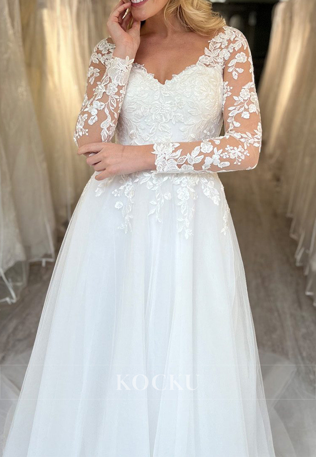 White Appliques Sweetheart Sheer Back A-Line Wedding Dress with Long Sleeves