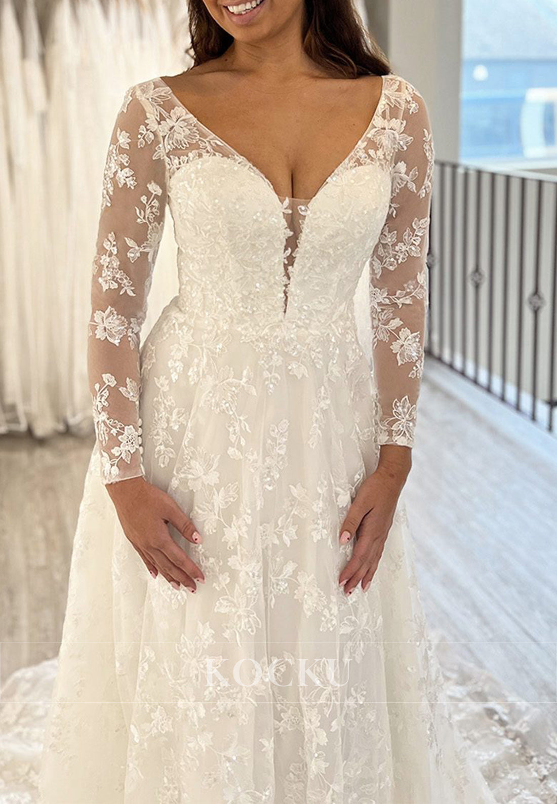 White Applique Deep Neck Backless A-Line Long Wedding Dress with Sheer Long Sleeves