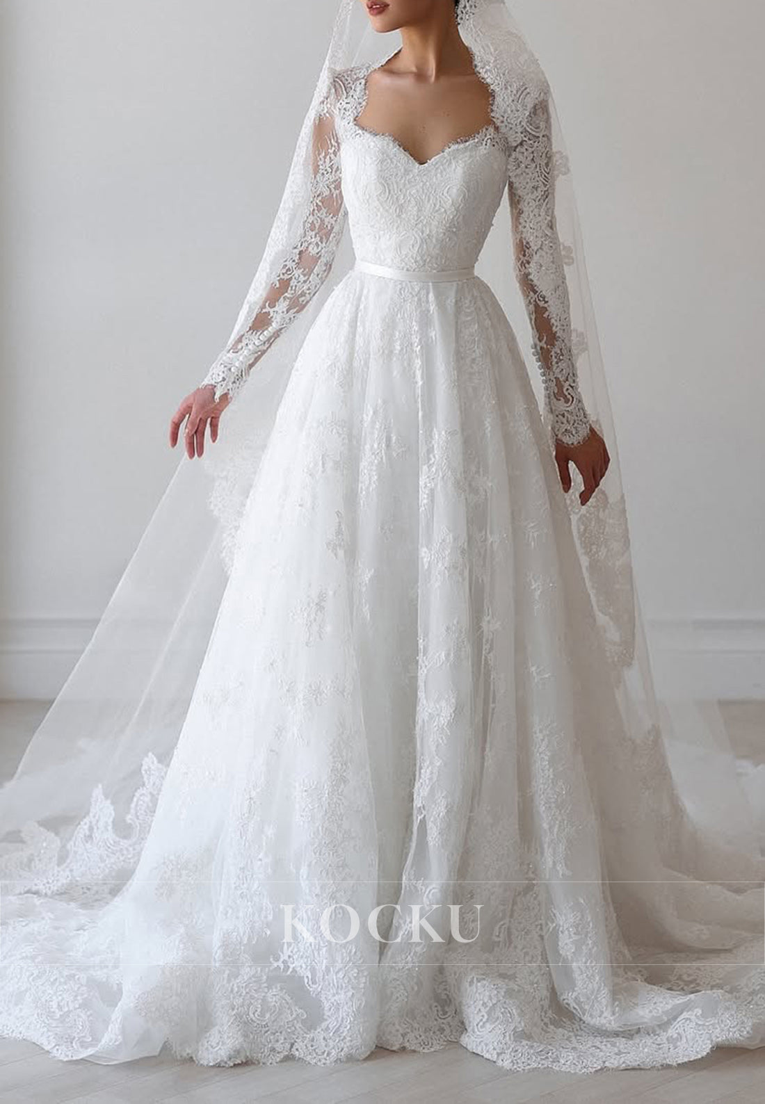 Romantic Lace Ball Gown Wedding Dress with Sheer Long Sleeves and Sweetheart Neckline