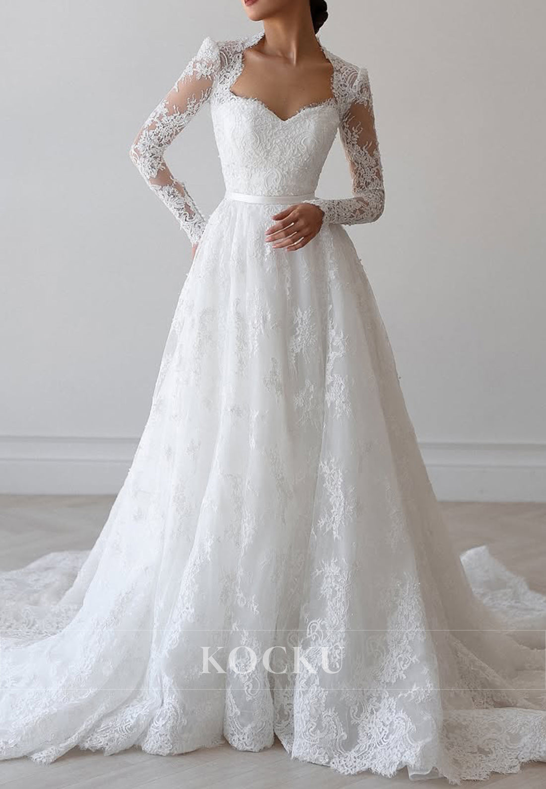 Romantic Lace Ball Gown Wedding Dress with Sheer Long Sleeves and Sweetheart Neckline